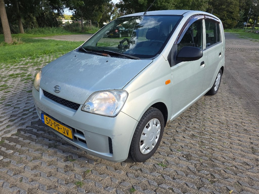 Daihatsu Cuore 1.0 5D 2004 Beige, Auto's, 600 kg, 4 stoelen, Cuore, Beige
