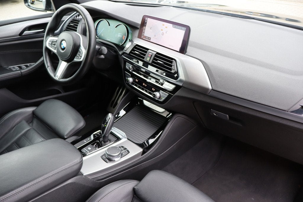 BMW X4 xDrive20i High Executive Apple carplay/Achteruitrijca, Automaat, Gebruikt, 4 cilinders, Zwart