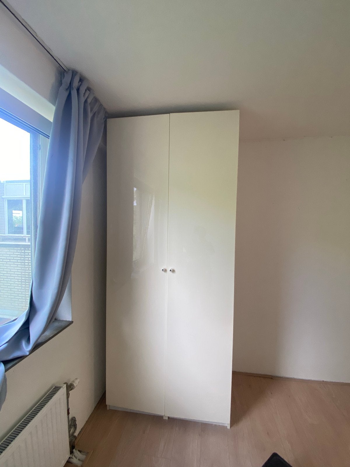 Witte IKEA Pax kledingkast met lades en planken
