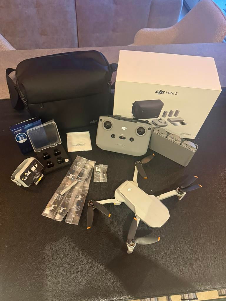 DJI Mini 2 Fly More Combo - Zo goed als nieuw, Audio, Tv en Foto, Drones, 30 tot 45 minuten, Cameradrone, Extra accu('s), 5 tot 10 kilometer