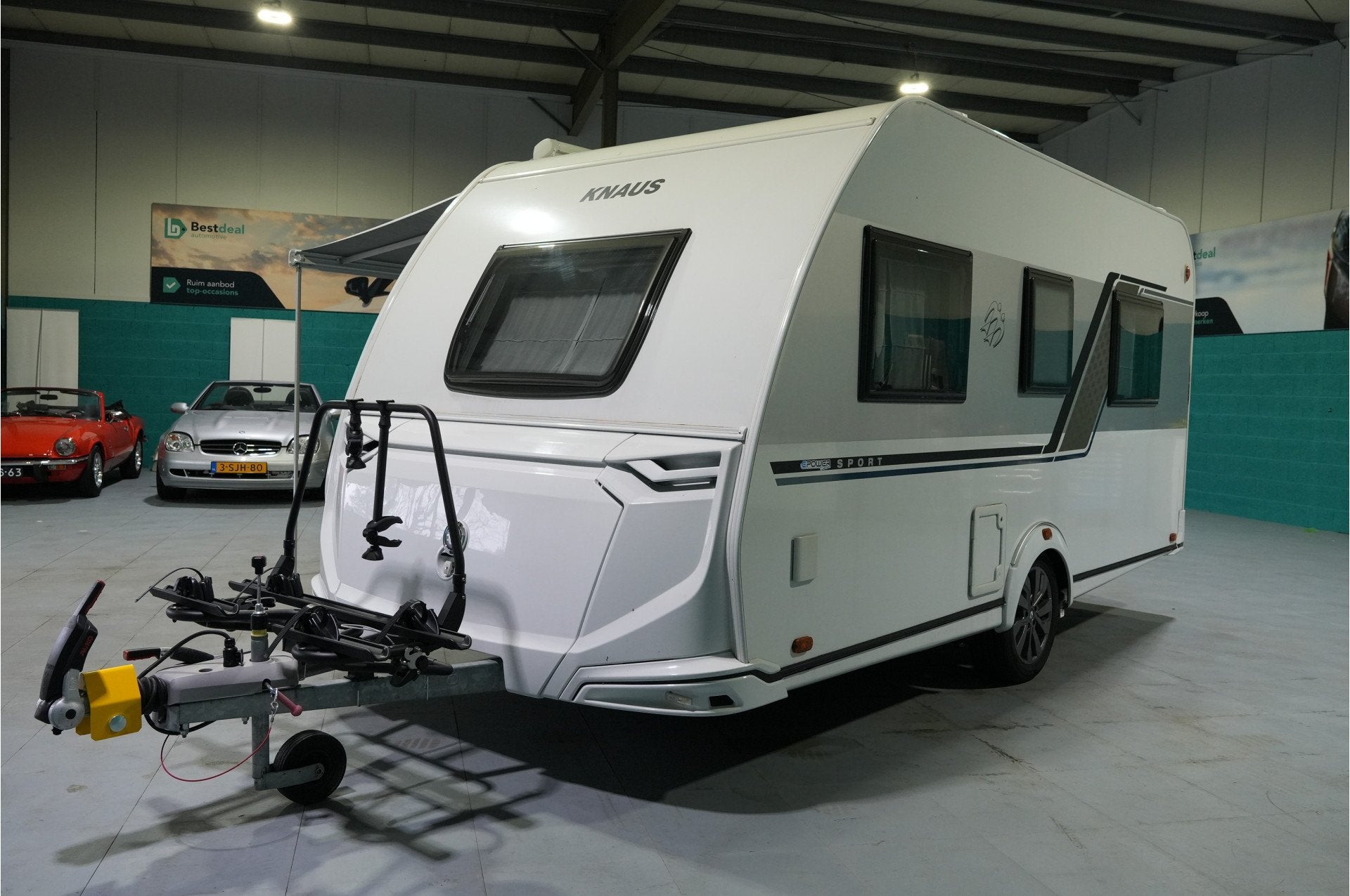 Knaus W04 Sport 420 E-Power | Mover | Luifel | TV | Fietsdra, Caravans en Kamperen, Bestdeal Automotive B.V., Vroomshoopseweg 33D
7683RJ  DEN HAM OV, NL