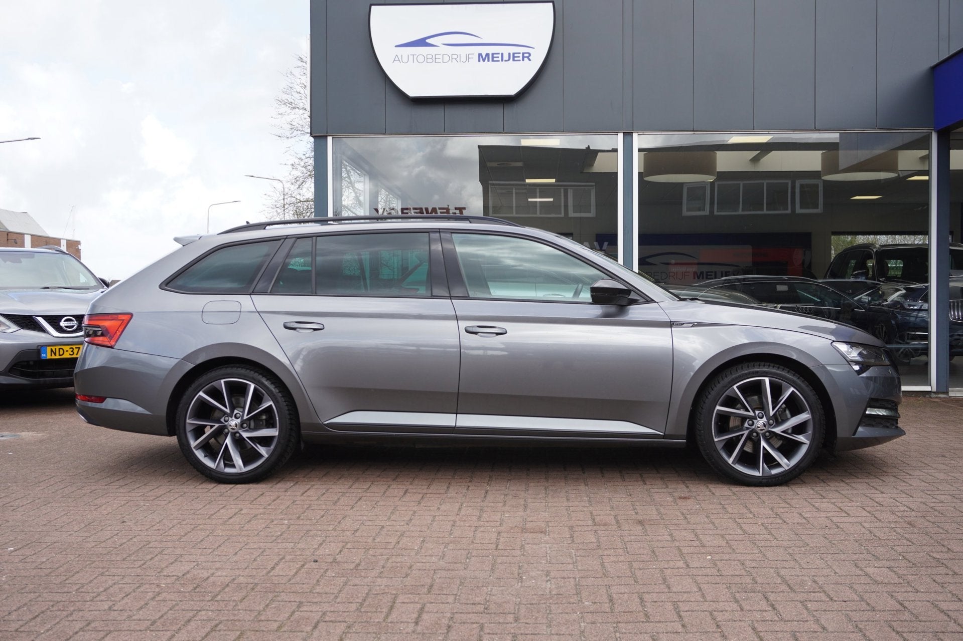 Skoda Superb Combi 1.4 TSI iV Sportline Business Automaat |, Auto's, Dealer onderhouden, 1695 kg, Hybride Elektrisch/Benzine, 1600 kg