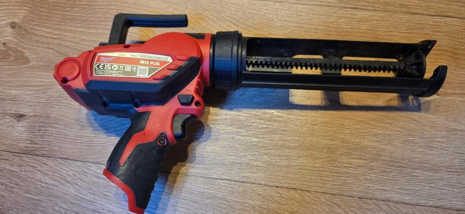 Milwaukee M12 PCG Kit Accu Kitpistool, Ophalen