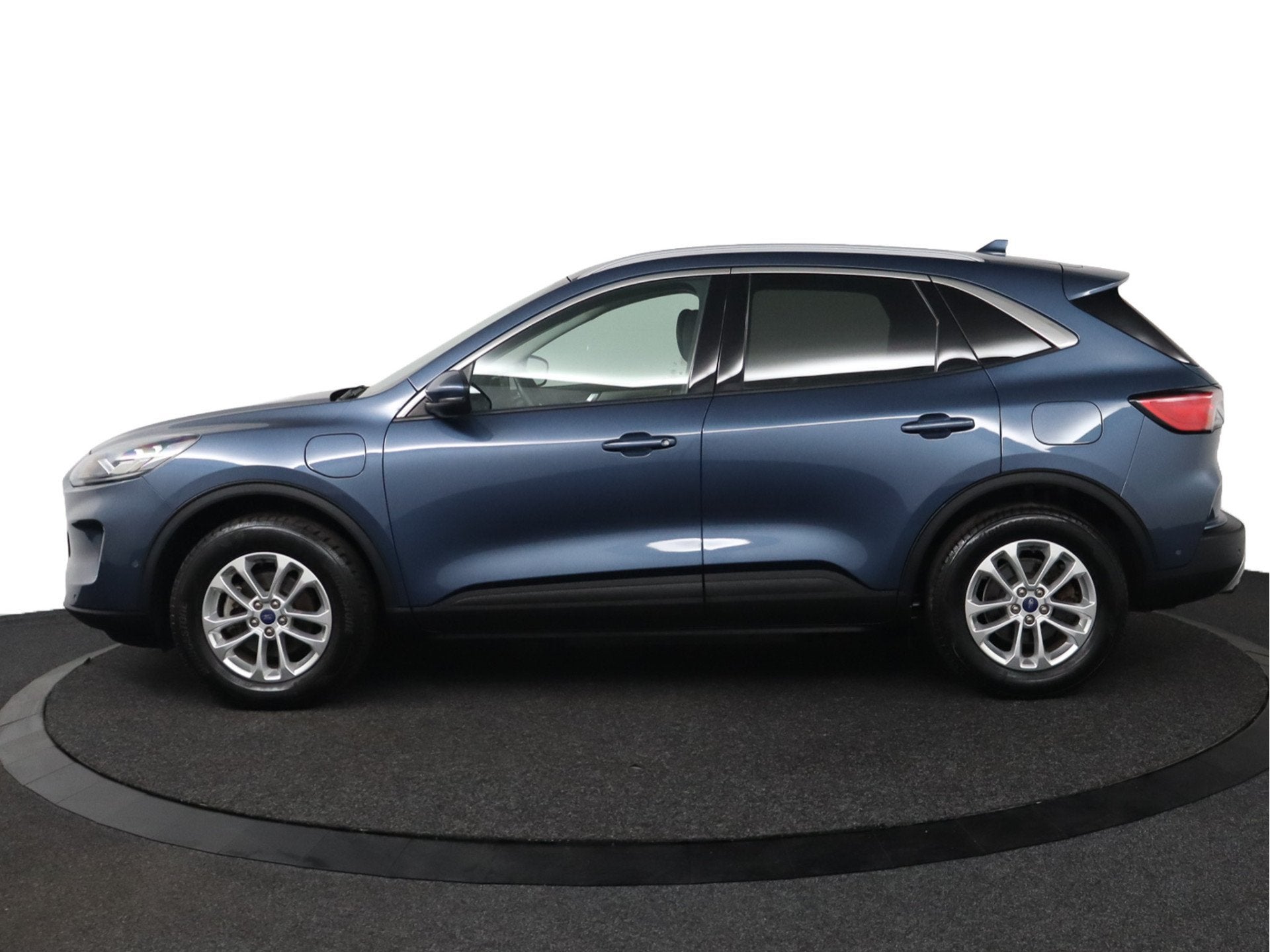 Ford Kuga 2.5 PHEV Titanium X | Trekhaak | Stoelverwarming |, Auto's, Gebruikt, 4 cilinders, Blauw, Leder en Stof