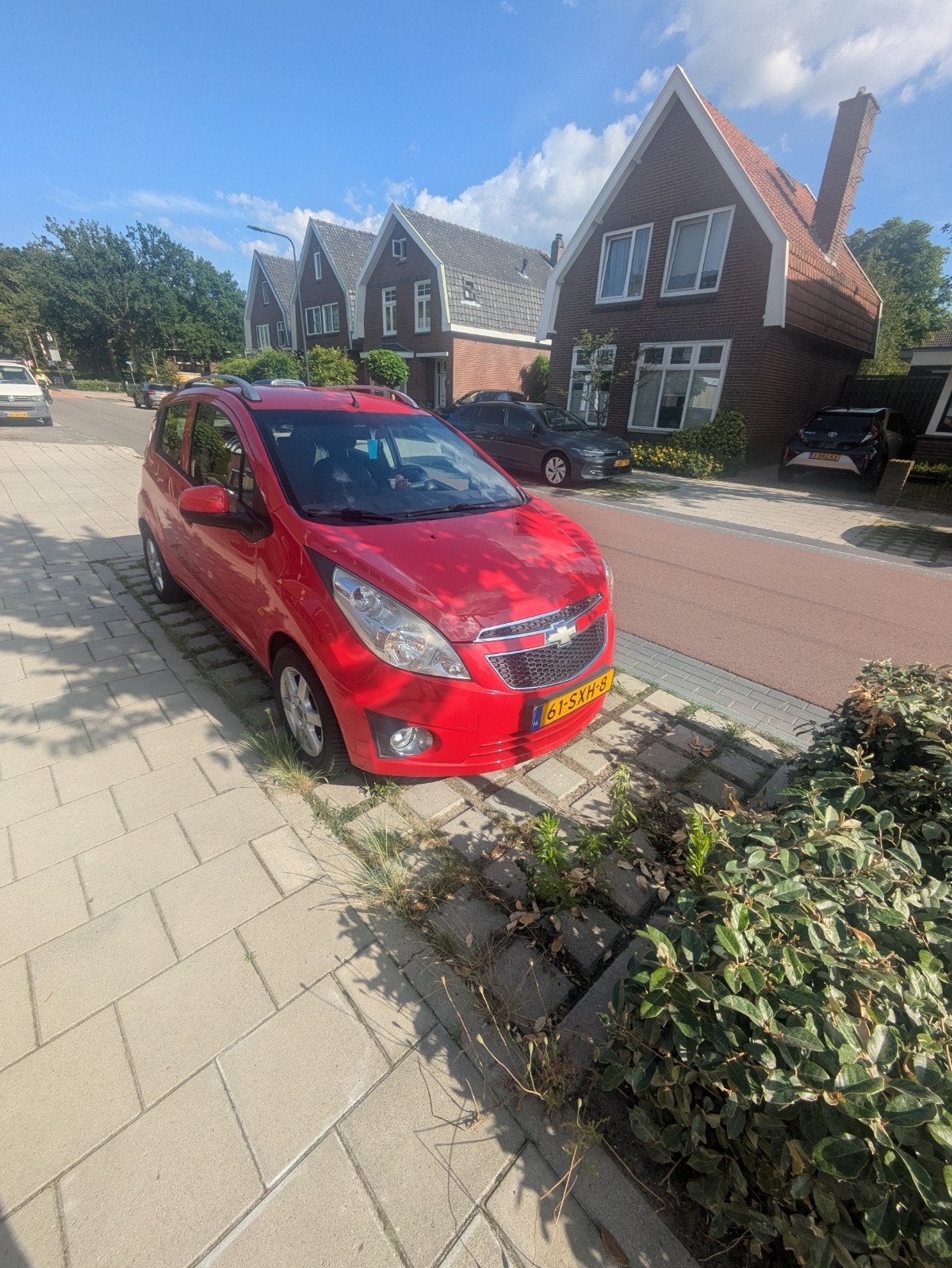 Chevrolet Spark 1.0 Bifuel 2012 Rood, Auto's, 37 €/maand, 4 cilinders, Origineel Nederlands, Particulier
