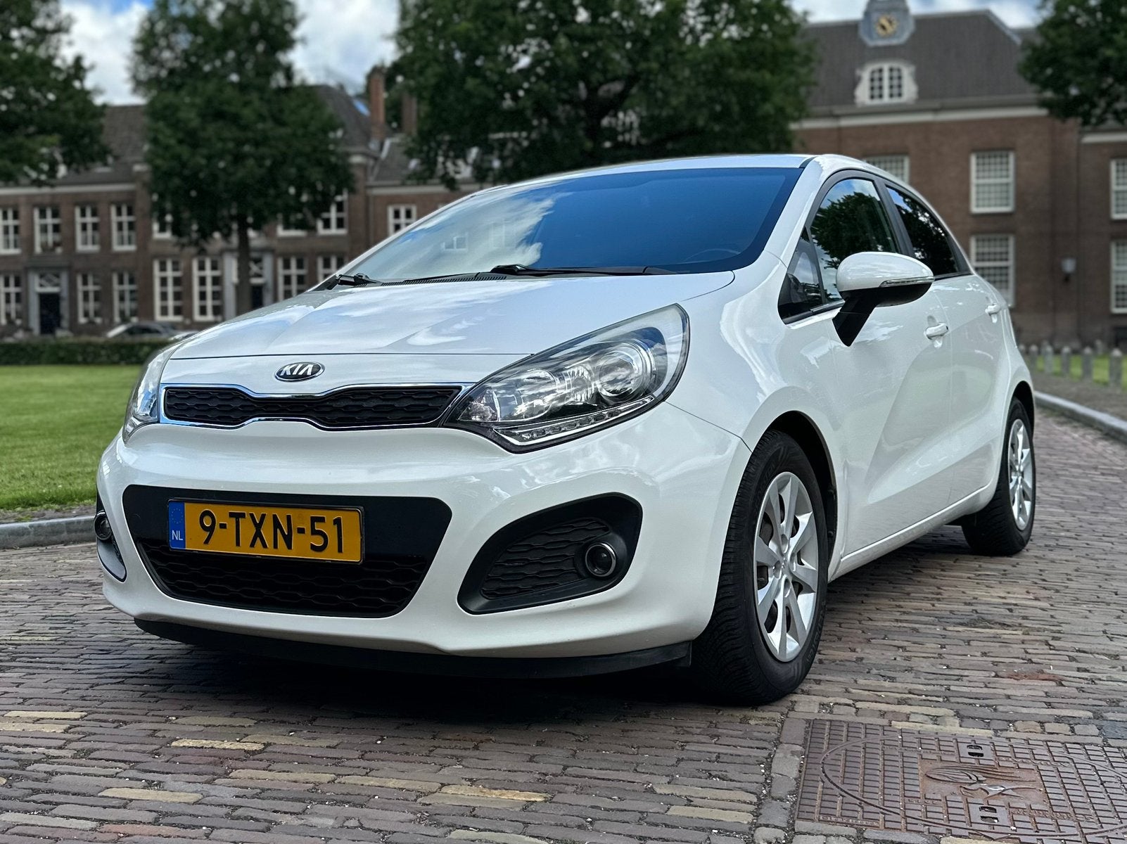Kia Rio 1.2 I 5DRS 2014 Wit super pack, 40 €/maand, 4 cilinders, Wit, Origineel Nederlands