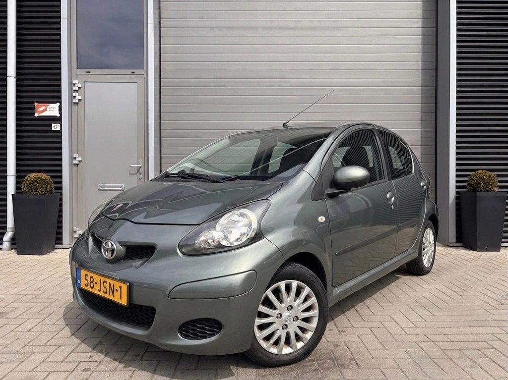 Toyota Aygo 1.0-12V Aspiration Green, Auto's, Toyota, Voorwielaandrijving, Gebruikt, Zwart, 4 stoelen