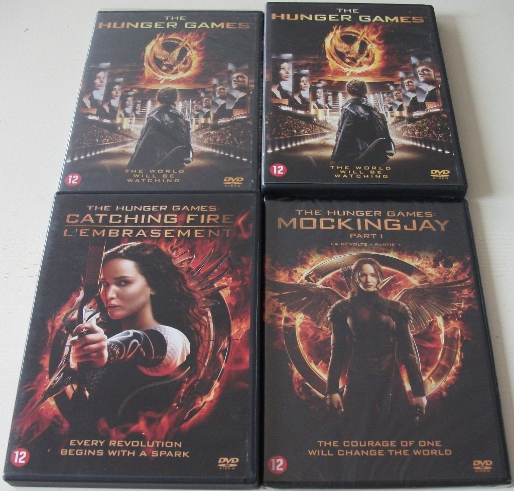 Film-Serie *** HUNGER GAMES *** Deel 1 + 2 + 3, Engels, Nederlands, Ophalen of Verzenden, Zo goed als nieuw