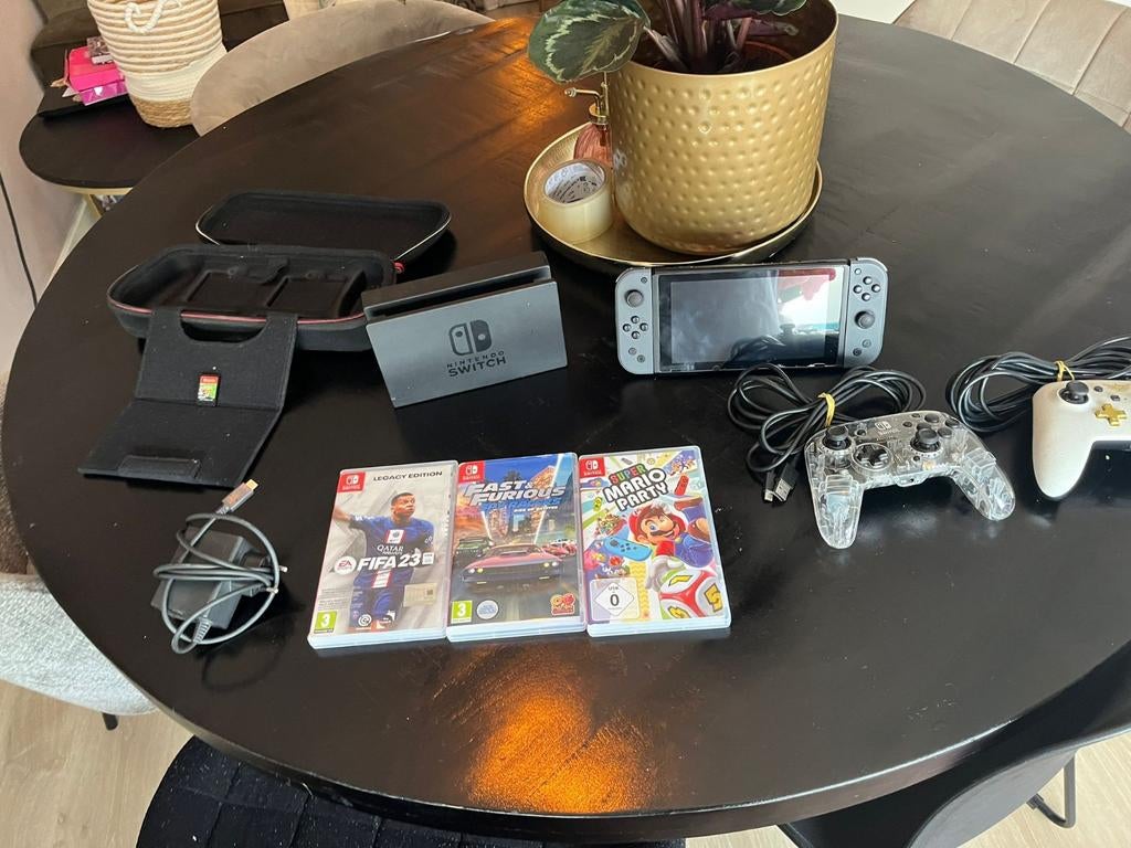 Nintendo Switch Zwart editie (Met games & controllers), Ophalen of Verzenden, Zo goed als nieuw