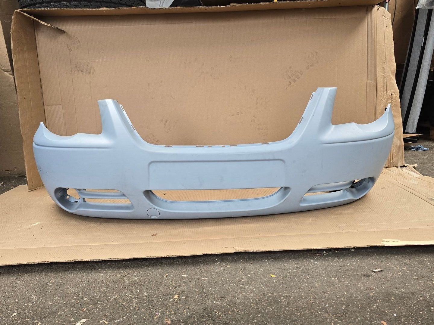 OEM Voorbumper Chrysler Voyager MK4 04857886 - Nieuw, Auto-onderdelen, Carrosserie en Plaatwerk, Ophalen, -, Voor, -
