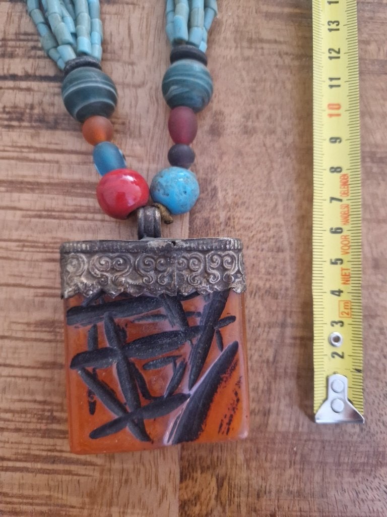 Etnische kralenketting met hanger van barnsteen., Ophalen of Verzenden