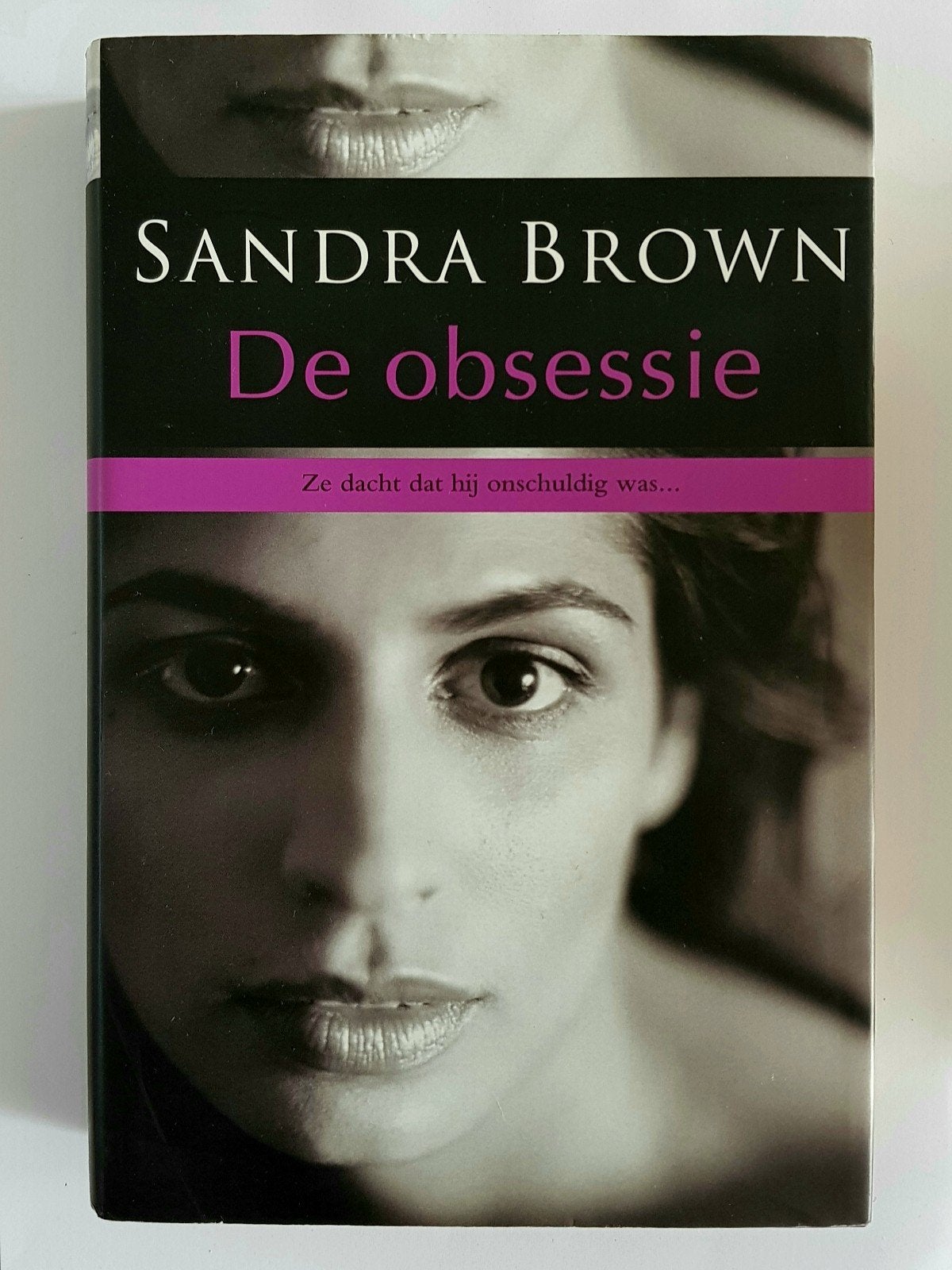 De Obsessie - Sandra Brown - boek, Ophalen of Verzenden, Zo goed als nieuw