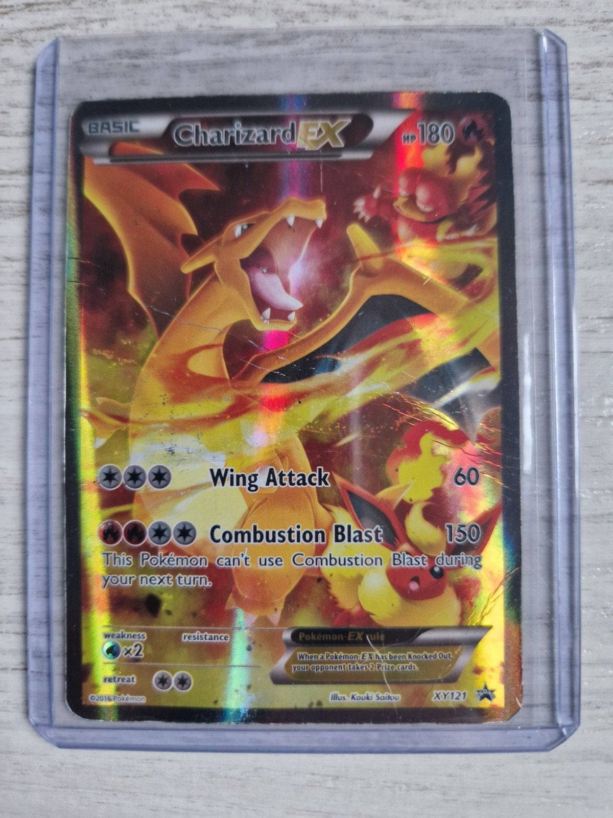 Charizard EX Pokémonkaart XY121, Ophalen of Verzenden, Gebruikt, Losse kaart, Foil