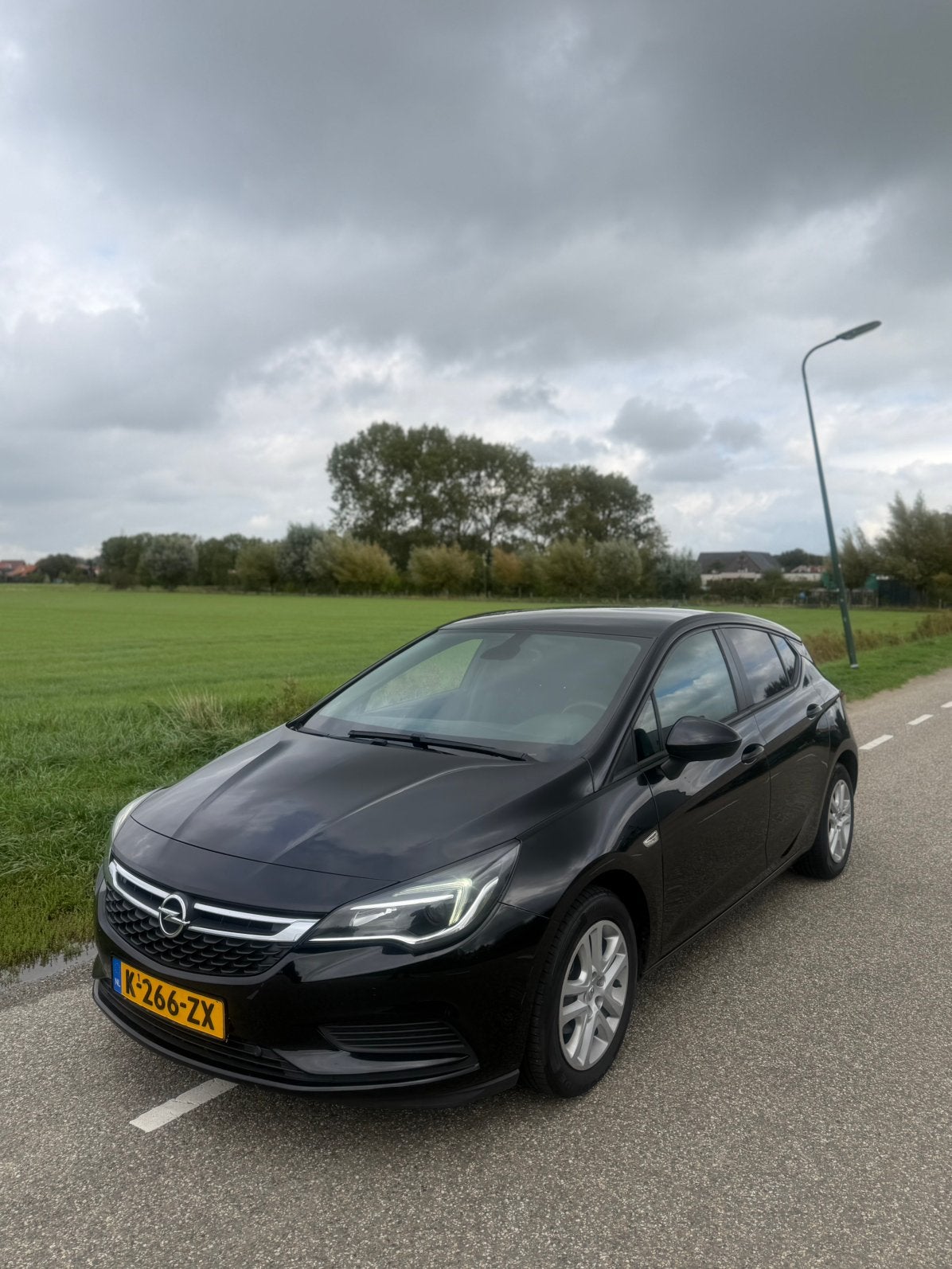 Opel Astra 1.0 Turbo 2016 PARKSENSOREN, Auto's, Stof, Zwart, 610 kg, Bedrijf