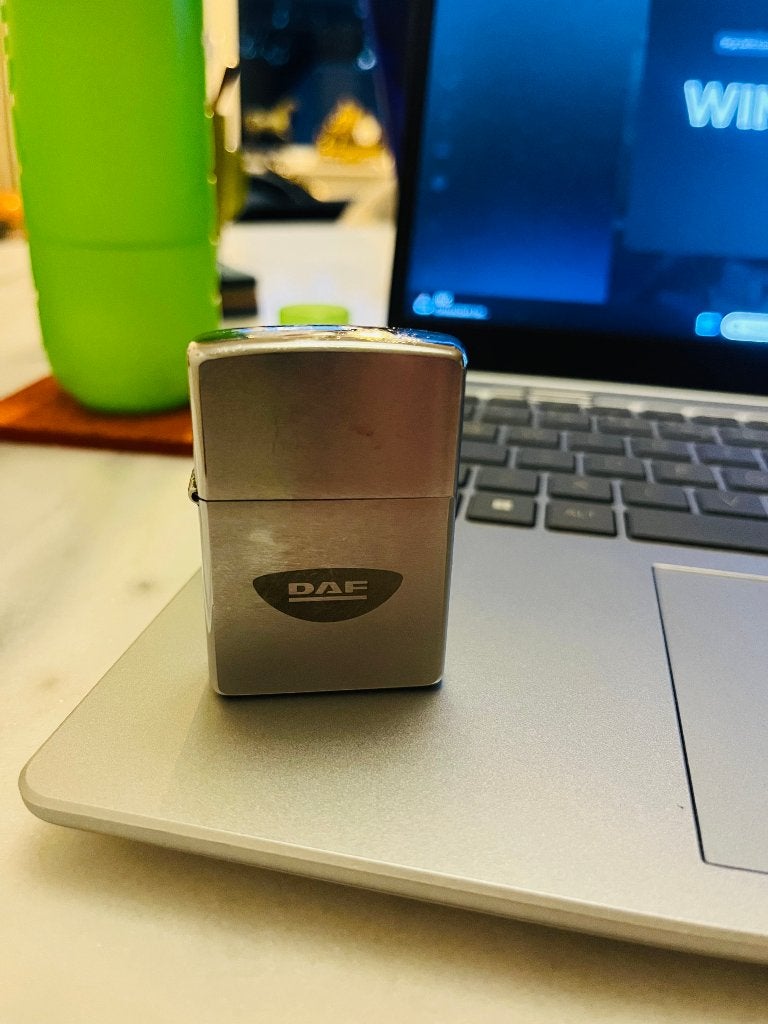 Zippo aansteker met DAF logo, Verzamelen, Ophalen of Verzenden, Gebruikt, Aansteker