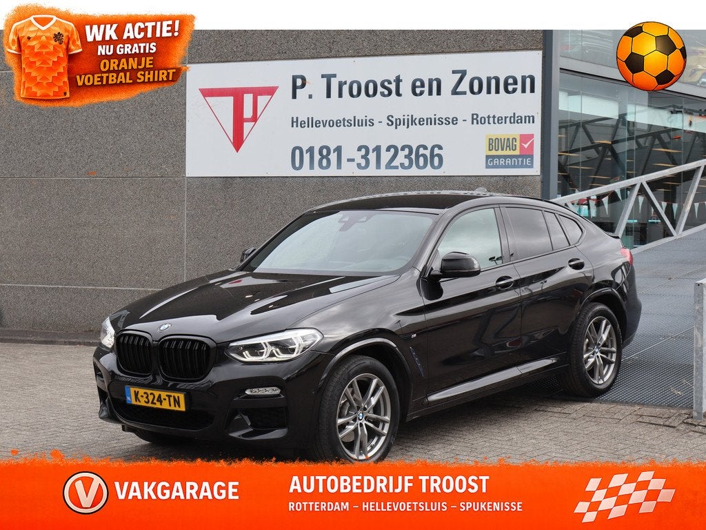 BMW X4 xDrive20i High Executive Apple carplay/Achteruitrijca, Automaat, Gebruikt, 4 cilinders, Zwart