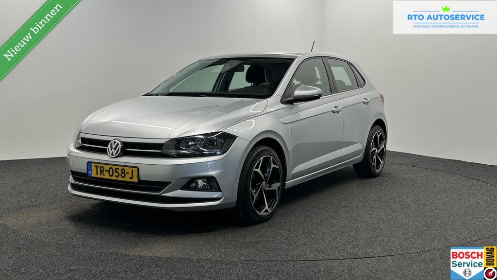 Volkswagen Polo 1.0 TSI CARPLAY TREKHAAK NAVI ADAPTIVE CRUIS, Voorwielaandrijving, Stof, Met garantie (alle), 23 km/l