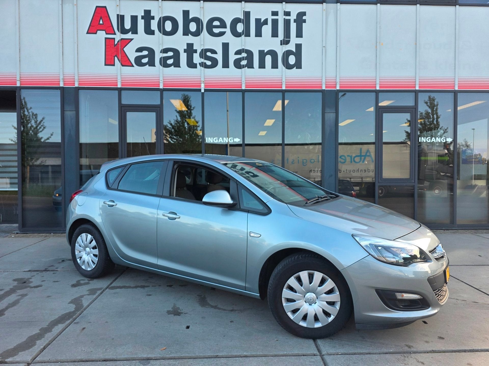 Opel Astra 1.4 Turbo Rhythm - Trekhaak - Airco, Auto's, Opel, Voorwielaandrijving, Euro 5, Stof, Gebruikt