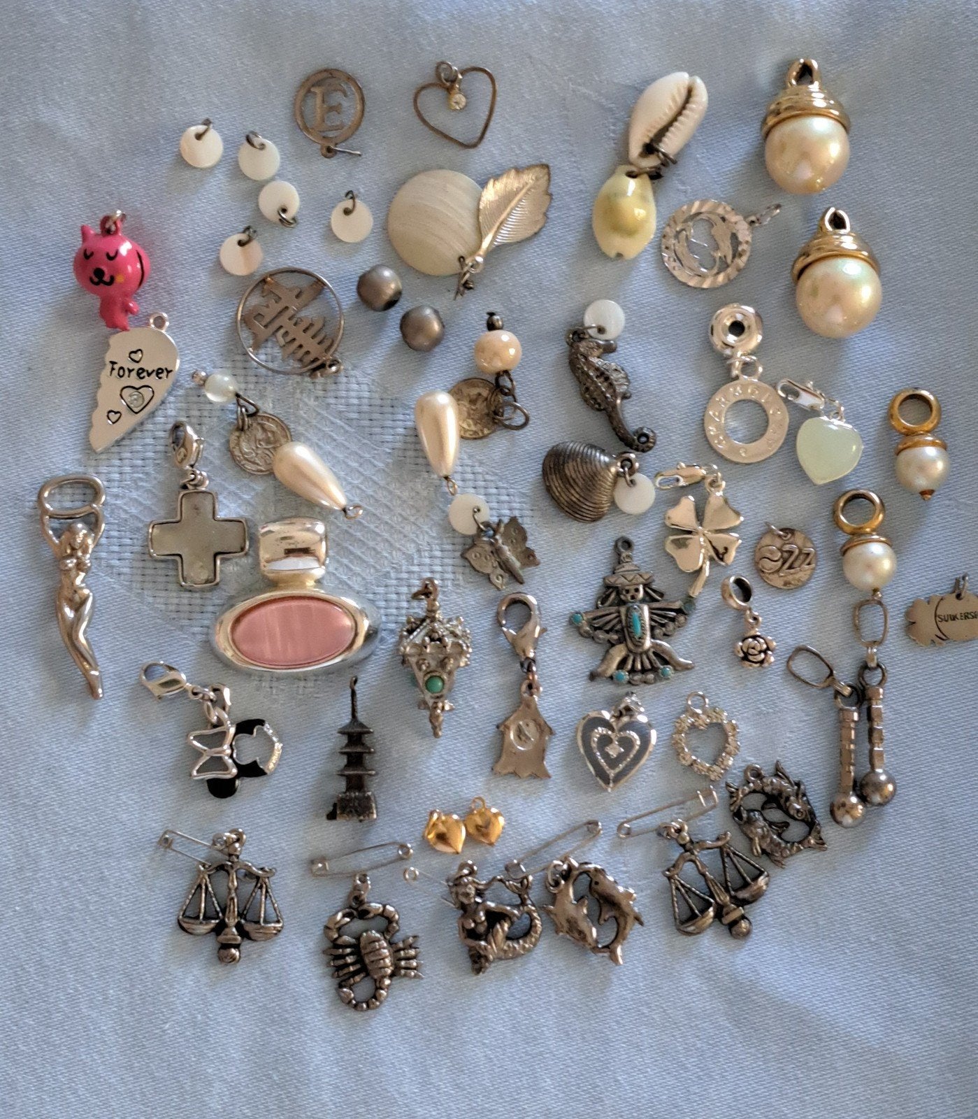 ca 50 bedels en of hangers, Ophalen of Verzenden, Overige materialen, Oor- of Traguspiercing