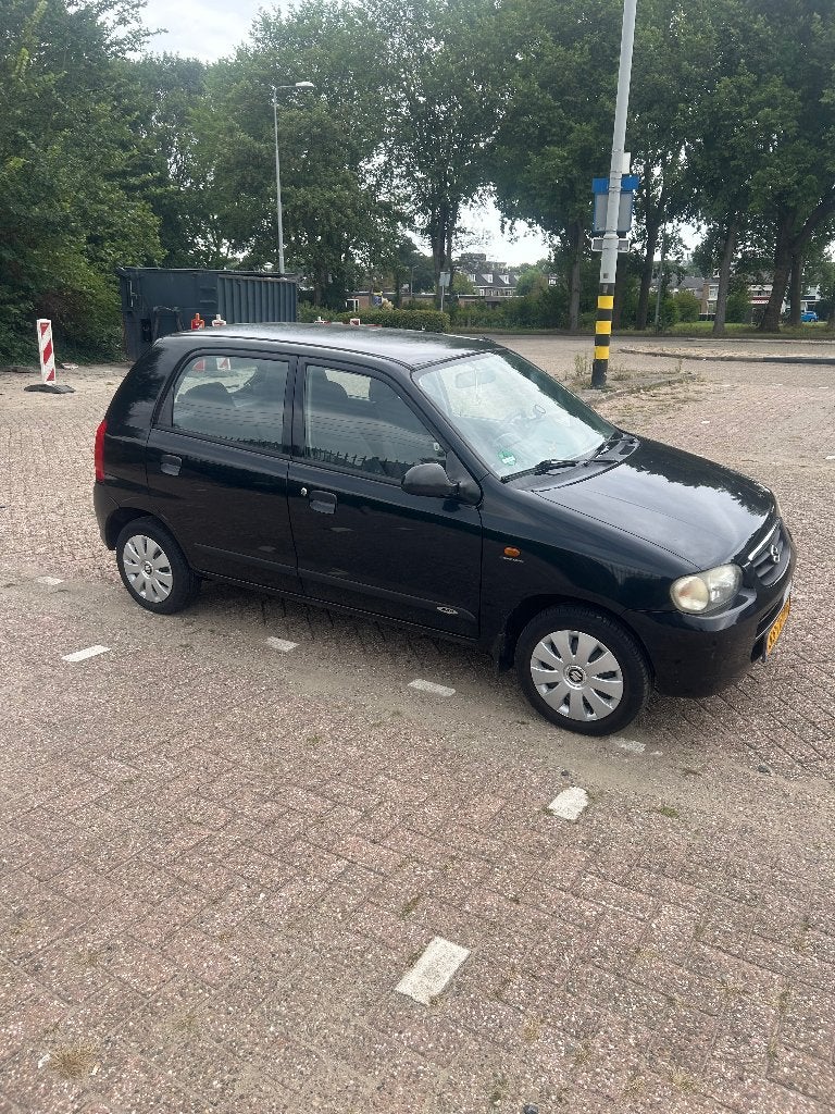 Suzuki Alto 1.1 AUT 2006 Zwart, Stof, 4 cilinders, 4 stoelen, Zwart