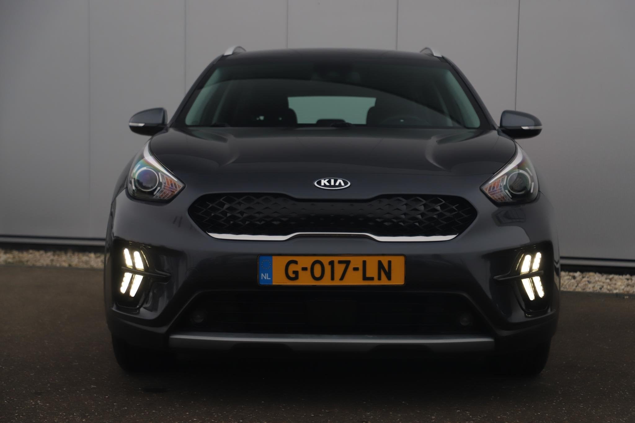 Kia Niro 1.6 GDi Hybrid DynamicLine 140PK Automaat Half Lede, Auto's, Kia, Gebruikt, Euro 6, Leder en Stof, Origineel Nederlands