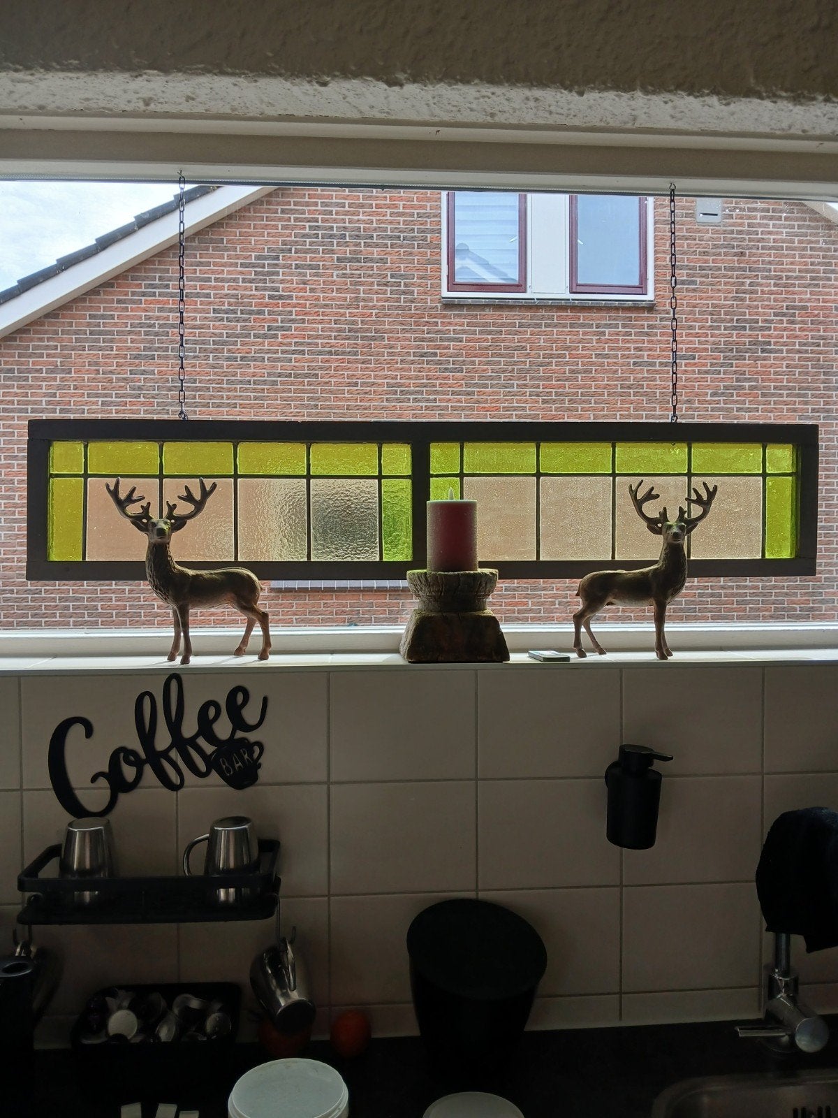 Glas in lood raam, Ophalen