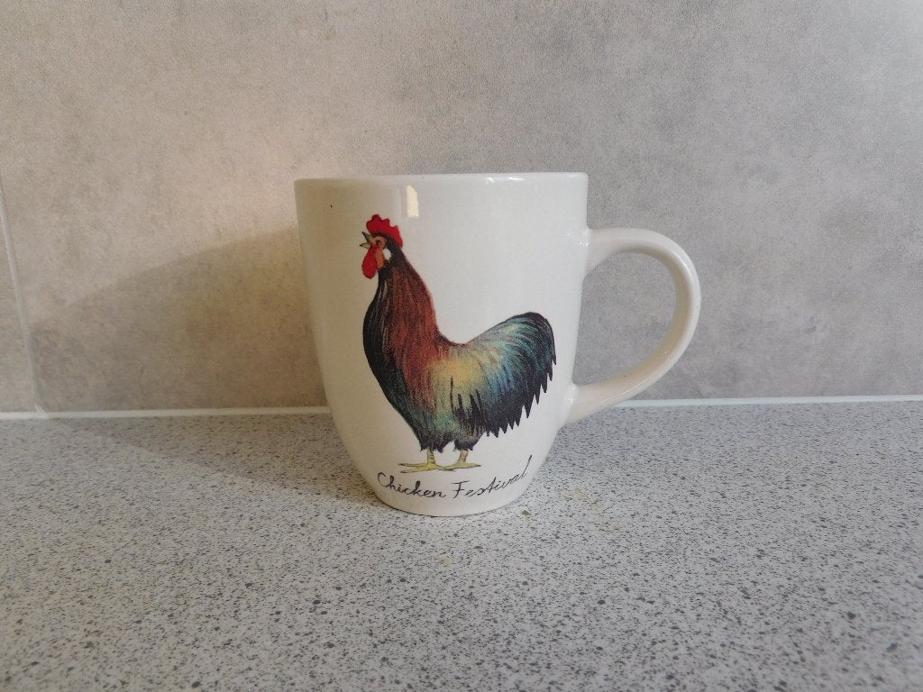 Mok 9x8 cm. Chicken Festival JET by ter Steege, Ophalen of Verzenden, Zo goed als nieuw, Overige stijlen, Kop(pen) en/of Schotel(s)