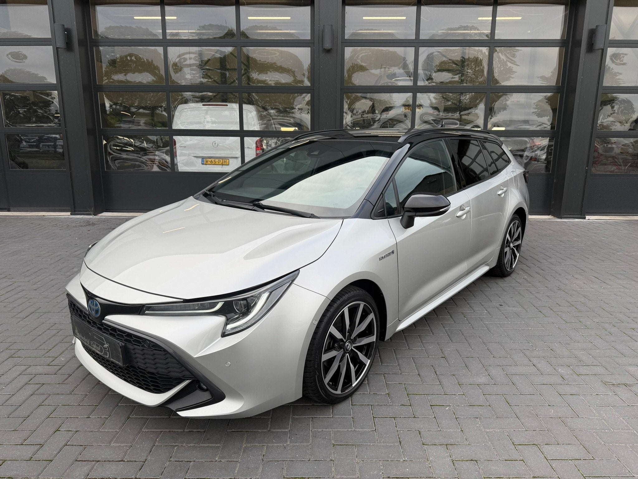 Toyota Corolla Touring Sports 1.8 Hybrid | ACC | Navi | LED, Auto's, Gebruikt, 4 cilinders, Parkeersensor, Origineel Nederlands