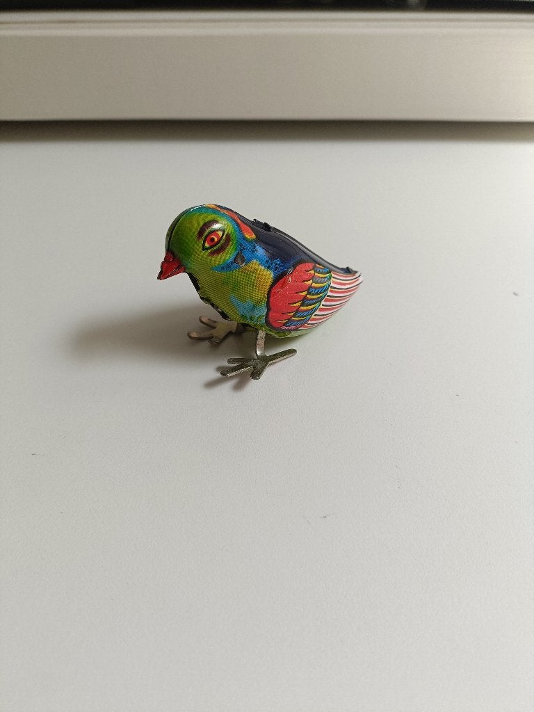 vintage blikken opwindspeeltje blue bird MS 029, Antiek en Kunst, Ophalen of Verzenden