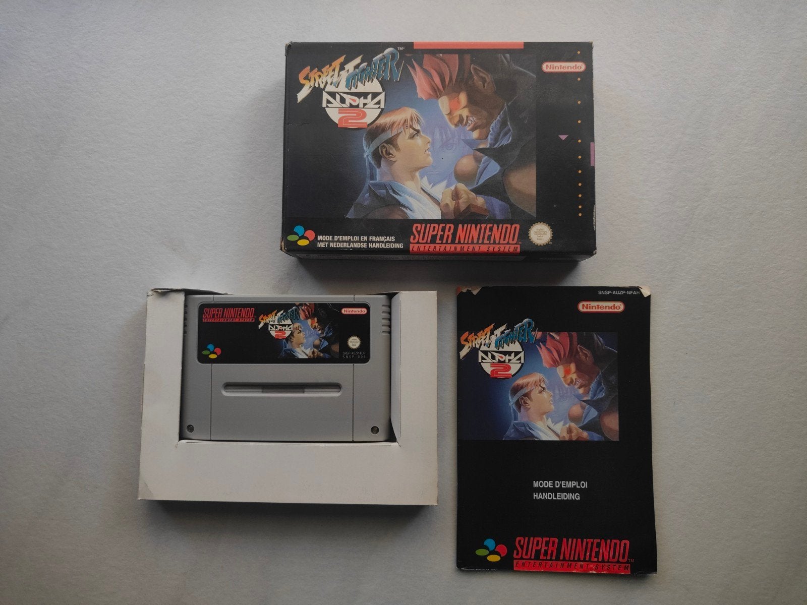 Street Fighter Alpha 2 SNES PAL compleet in doos – Nintendo, Spelcomputers en Games, Games | Nintendo Super NES, Gebruikt, Vechten