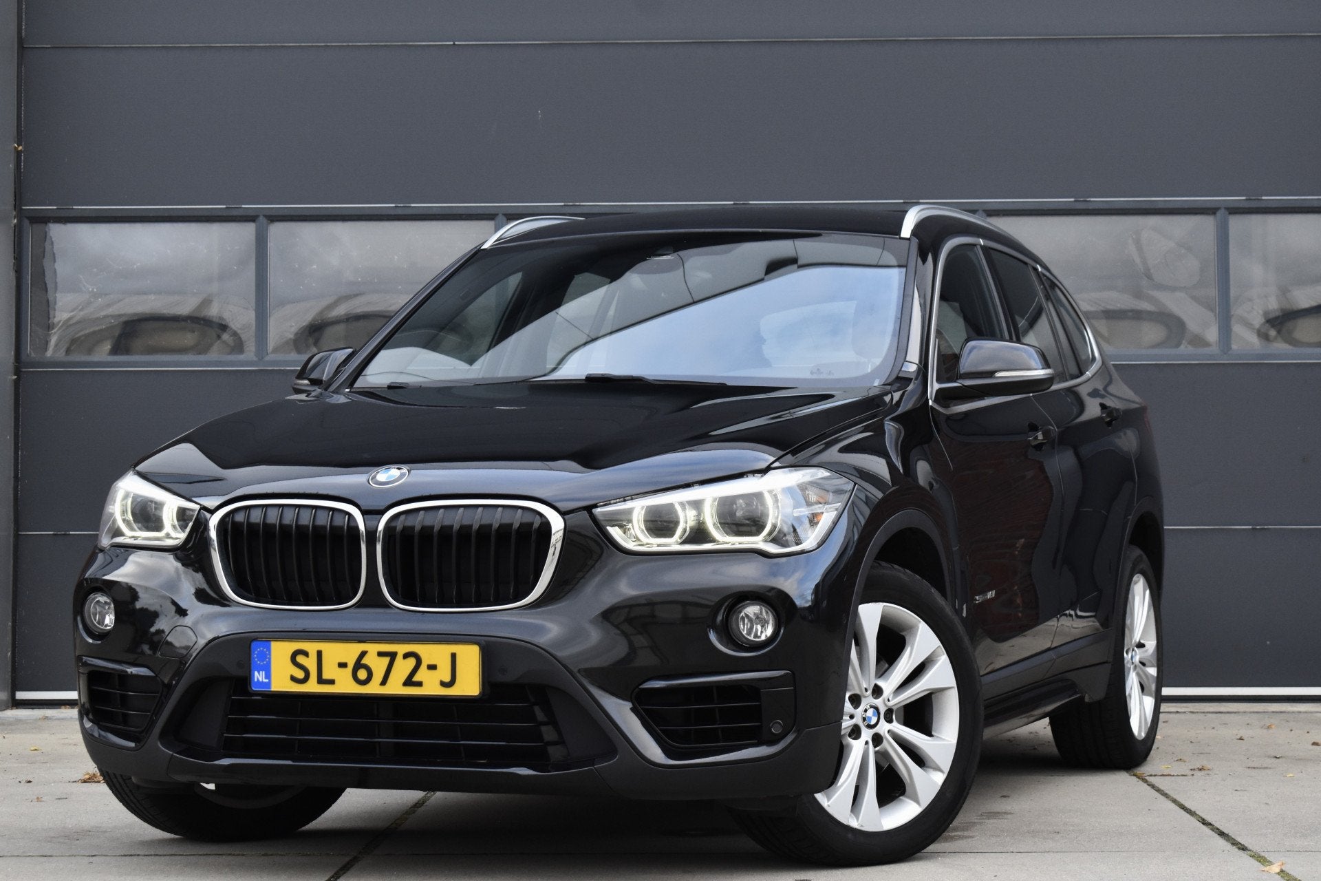 BMW X1 sDrive18i Executive NAP Navi - Cruise - Lmv, Auto's, Stof, Gebruikt, Zwart, Origineel Nederlands