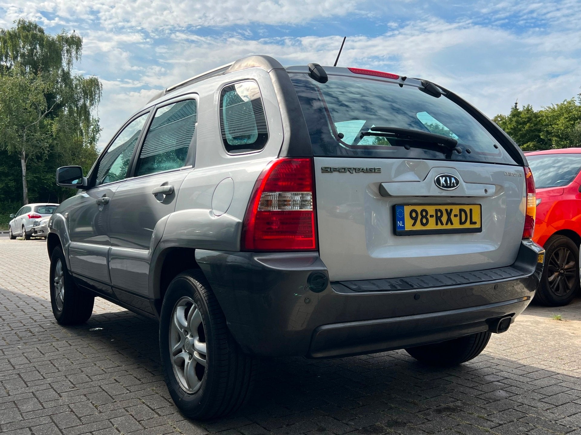 Kia Sportage 2.0 CVVT X-ecutive LPG G3 Clima / Cruise Contro, Auto's, Kia, 1486 kg, Gebruikt, Leder en Stof, Origineel Nederlands
