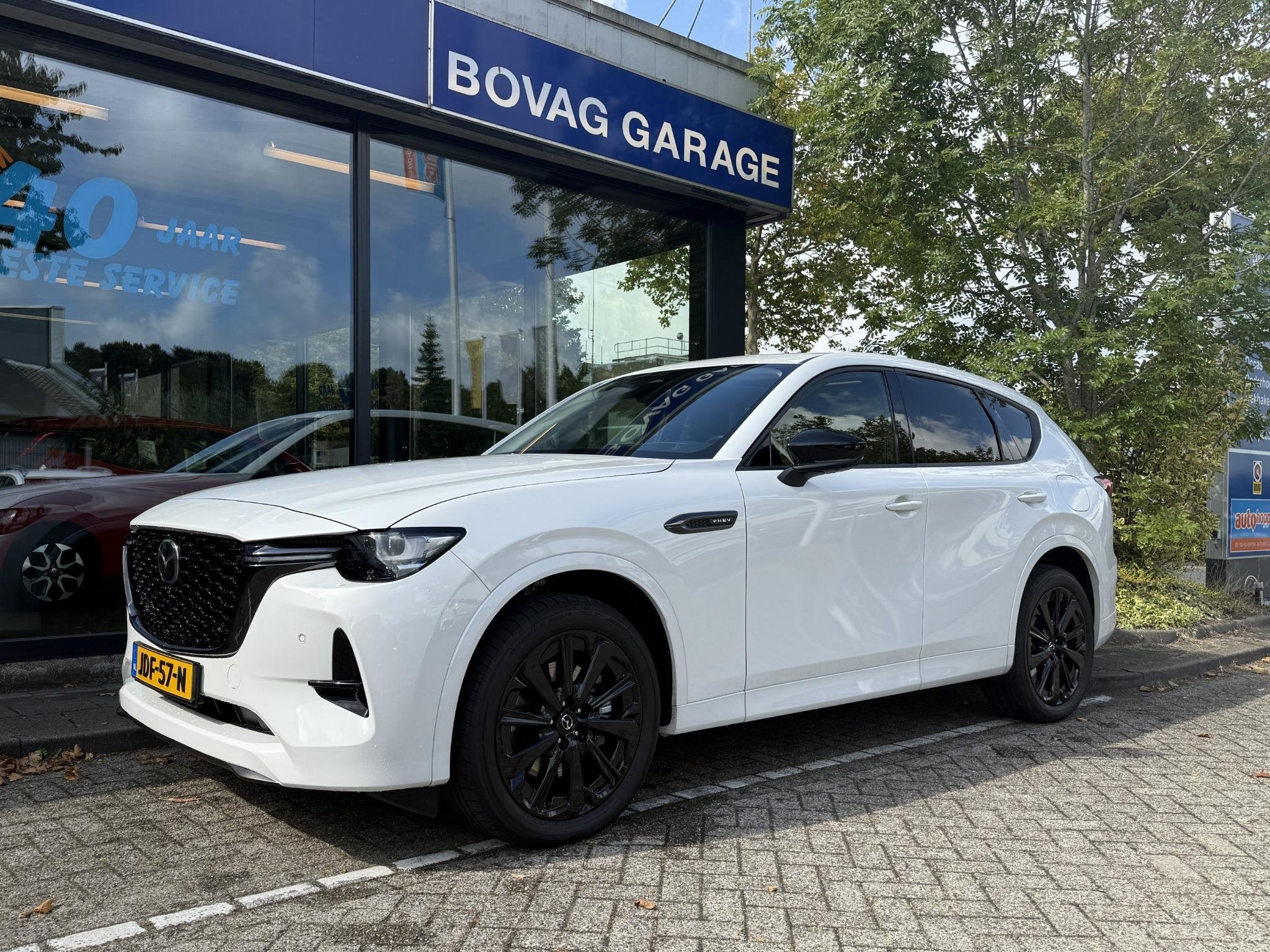 Mazda CX-60 2.5 e-SkyActiv PHEV Homura Business Edition Bose, Auto's, Automaat, Verwarmde buitenspiegels, Gebruikt, 4 cilinders