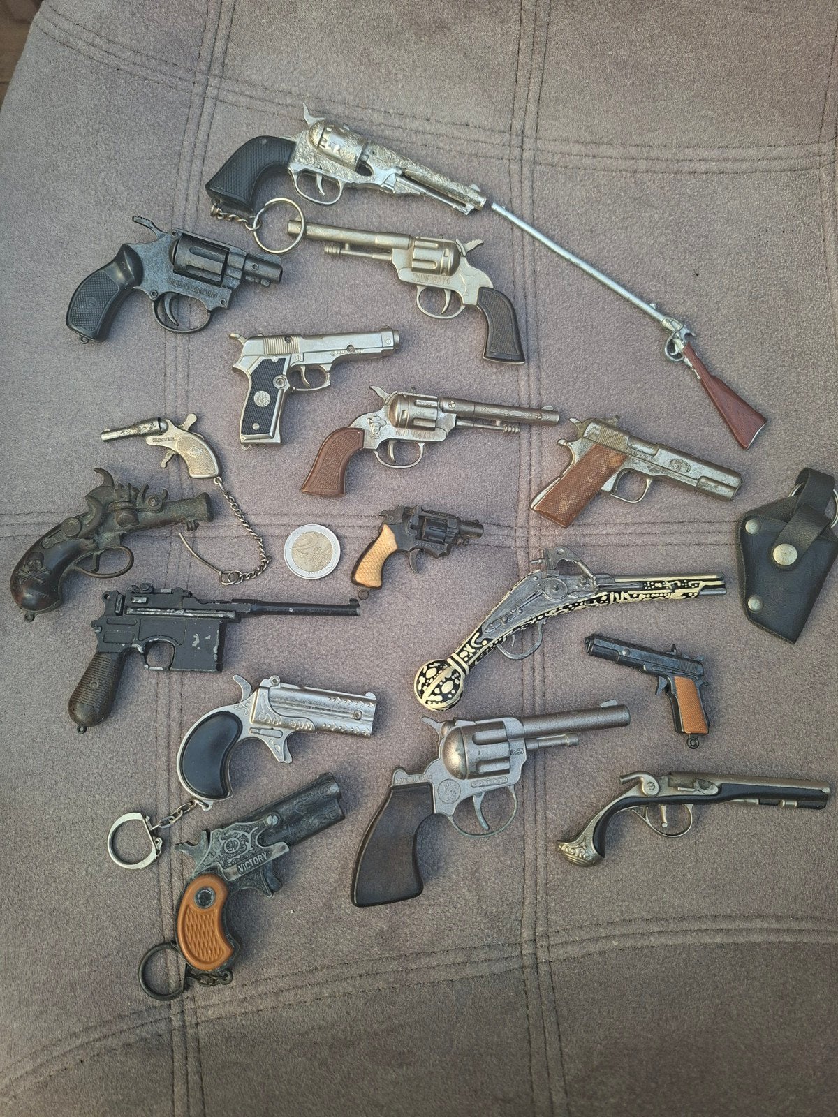 Miniatuur geweer pistool revolver, Ophalen
