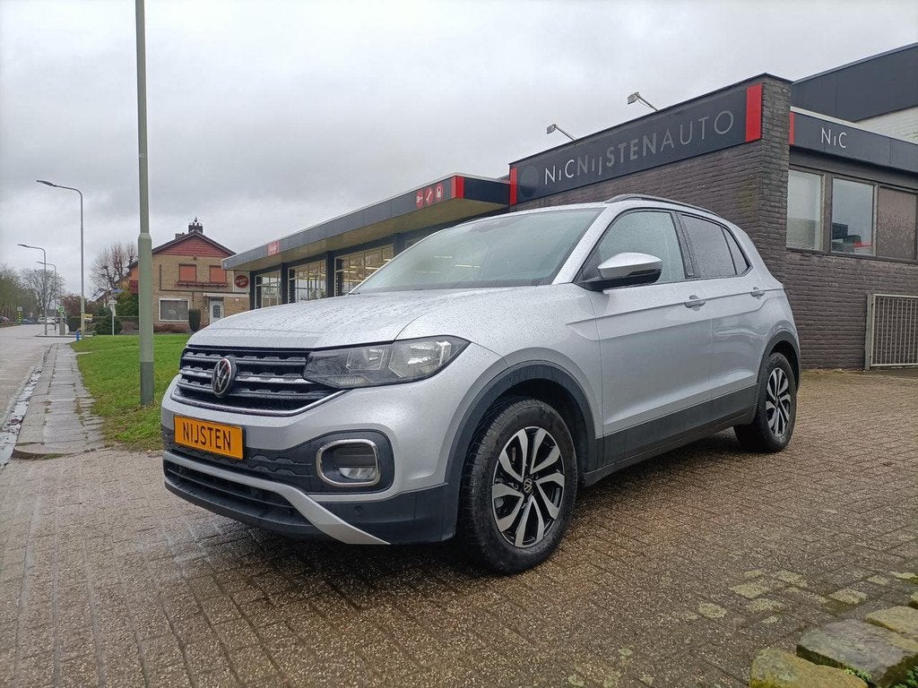 Volkswagen T-Cross 1.0i 110pk, Ad.Cruise,Trekhaak,Navi via M, Auto's, Gebruikt, Zwart, LED verlichting, Origineel Nederlands