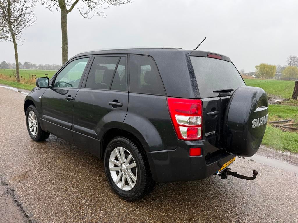 Suzuki Grand Vitara 2.0-16V Limited 4x4, Auto's, Stof, Zwart, 4 cilinders, 1850 kg