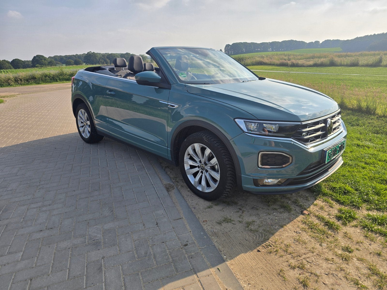 Volkswagen T-Roc 1.5 TSI 150pk 7-DSG 2020 Groen, Auto's, Volkswagen, Zwart, 4 cilinders, 4 stoelen, Bedrijf