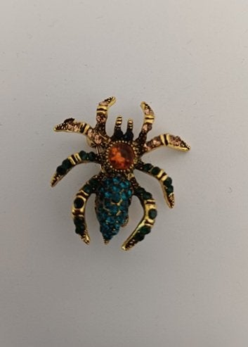 Goudkleurige broche spin aquablauw oranje, Ophalen of Verzenden, Nieuw, Blauw, Overige materialen