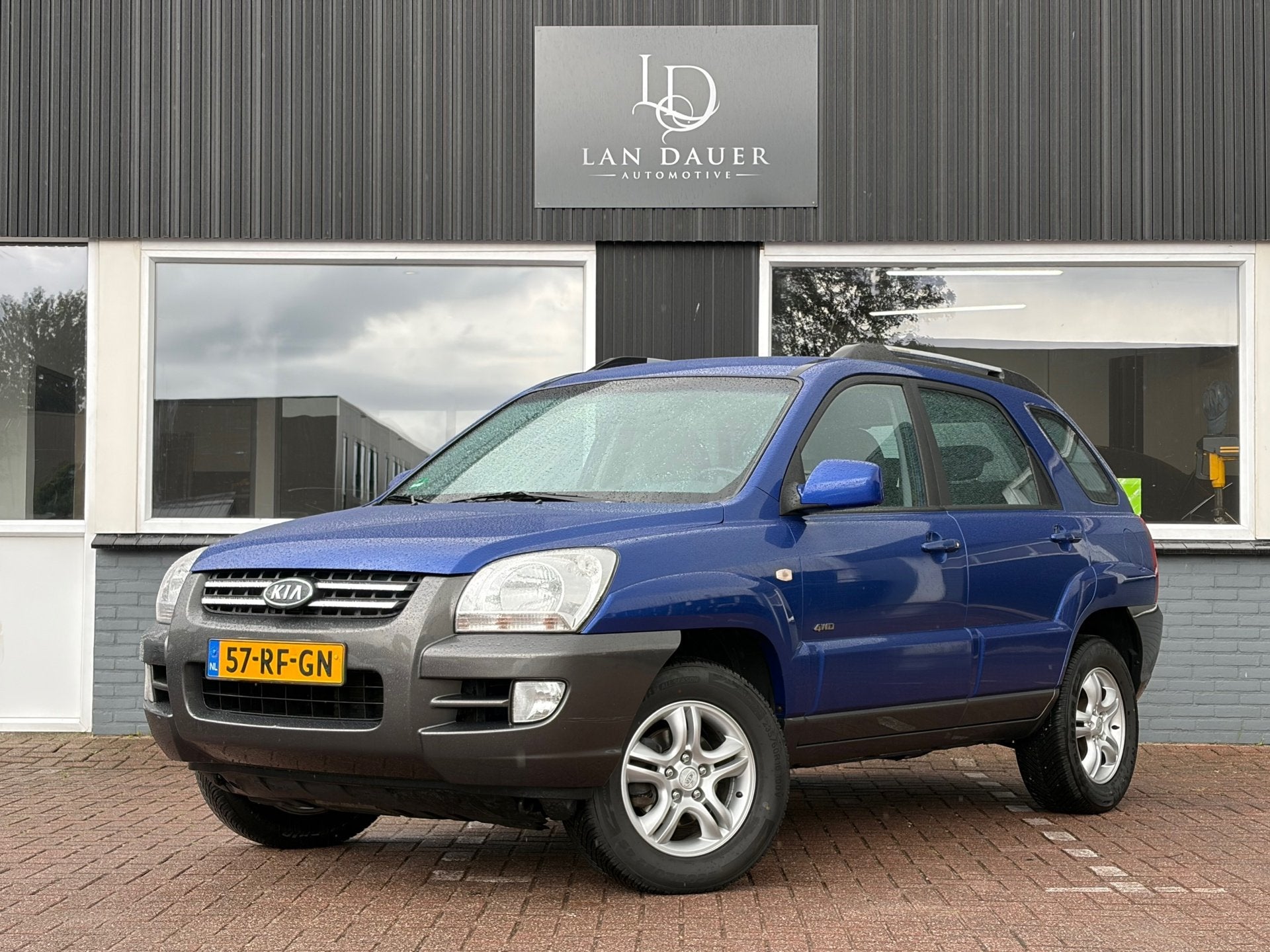 Kia Sportage 2.7 V6 Adventure 4WD / Automaat / APK, Automaat, Automatische klimaatregeling, Gebruikt, Blauw