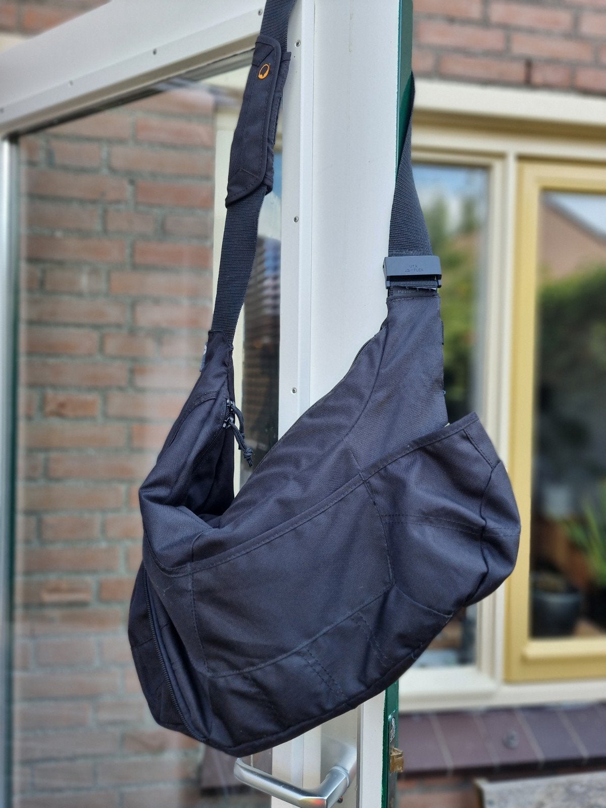 Zo goed als nieuwe Lowepro Passport Sling cameratas, Lowepro, Slingtas, Ophalen of Verzenden, Zo goed als nieuw