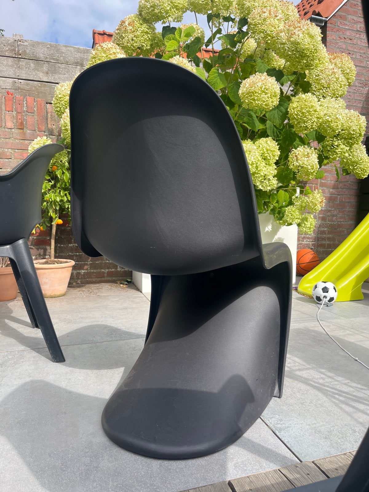Verner Panton stoel zwart, gebruikt, Huis en Inrichting, Kunststof, Gebruikt, Zwart, Ophalen of Verzenden