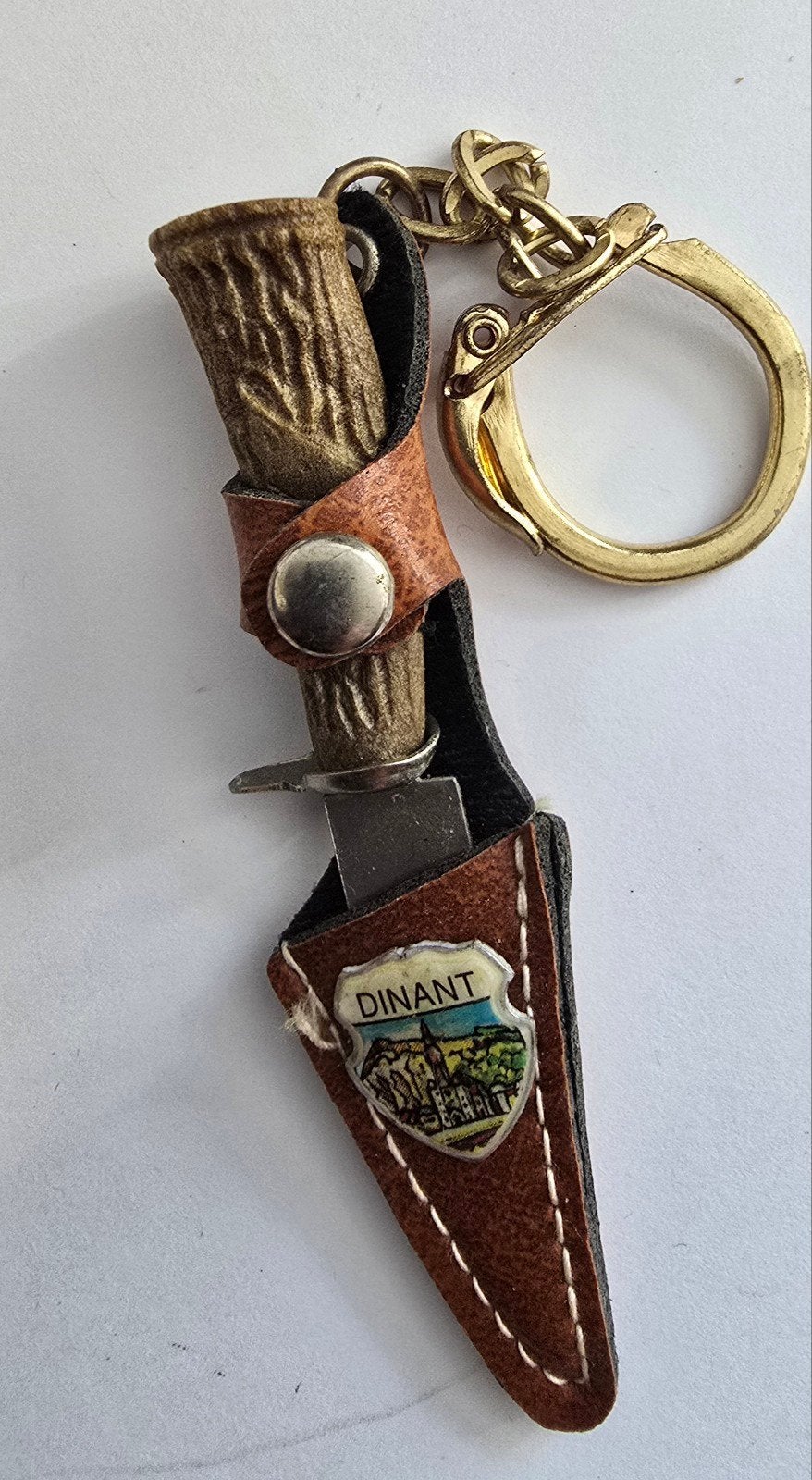 Sleutelhanger Dinant met mini mesje en geweigreep, Ophalen of Verzenden, Gebruikt, Stad of Land