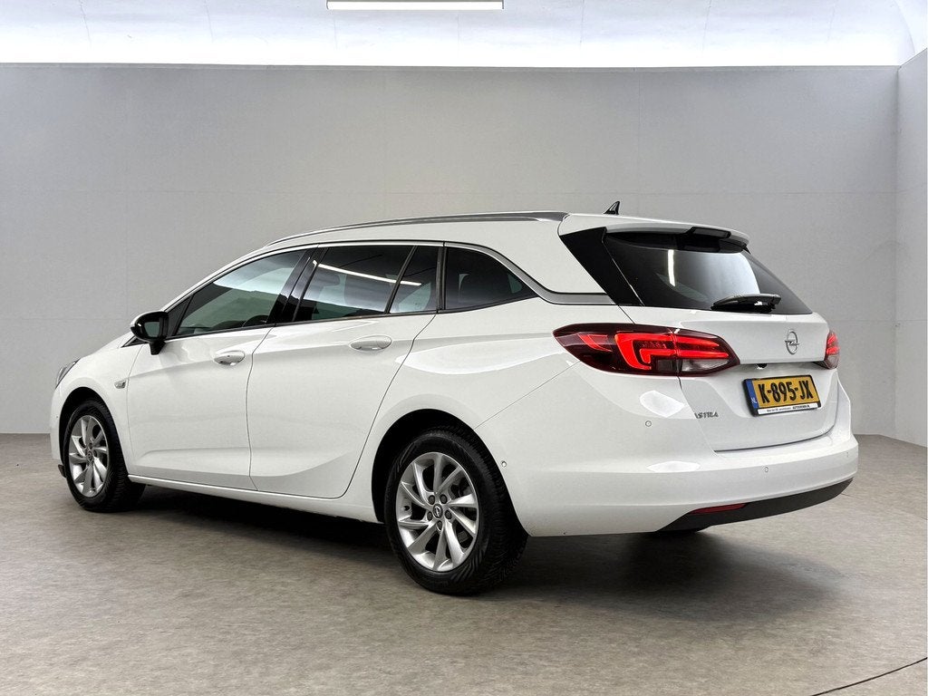 Opel Astra Sports Tourer 1.4 Elegance | Clima | Cruise | Cam, Auto's, Opel, 145 pk, Gebruikt, Wit, Origineel Nederlands