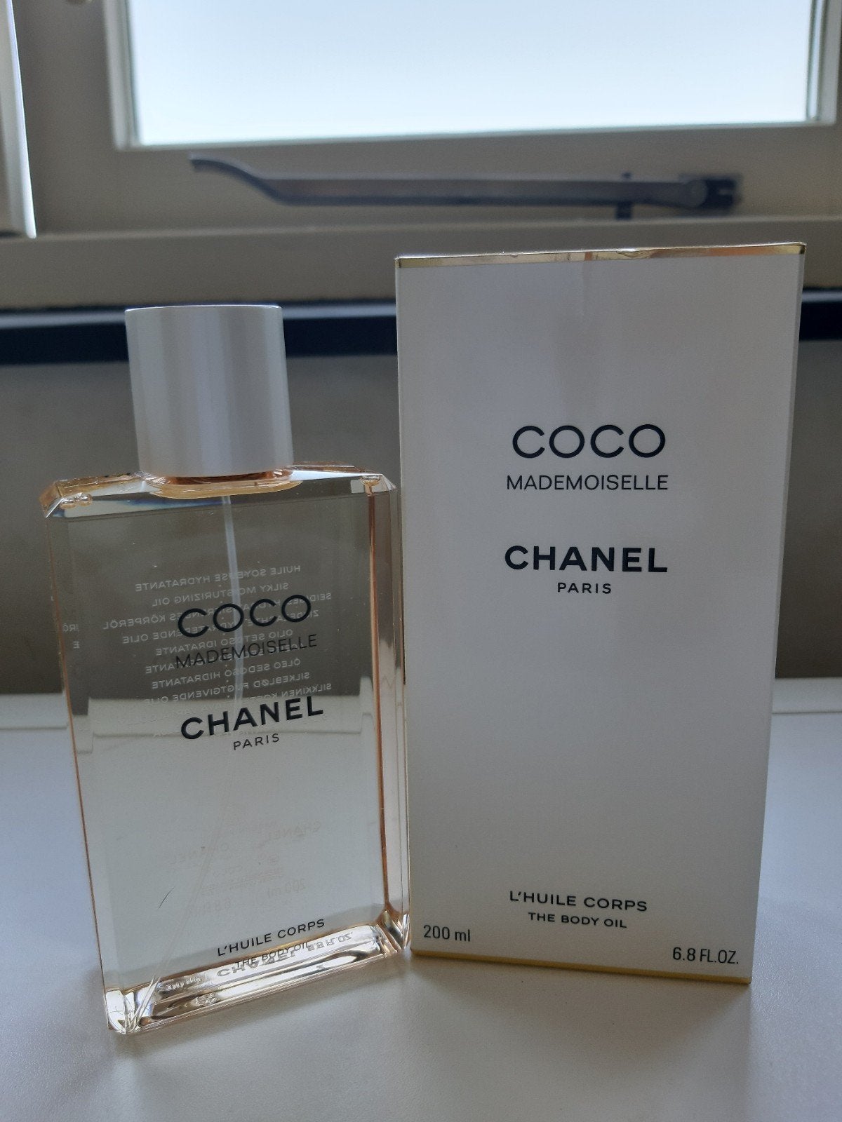 Coco Mademoiselle Body Oil 200ML., Sieraden, Tassen en Uiterlijk, Uiterlijk | Lichaamsverzorging, Verzenden, Nieuw, Bodylotion, Crème of Olie