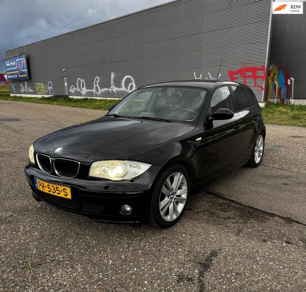 BMW 1-serie 120i High Executive | AUTOMAAT | AIRCO | TREKH|, Auto's, BMW, Achterwielaandrijving, 4 cilinders, 150 pk, Zwart