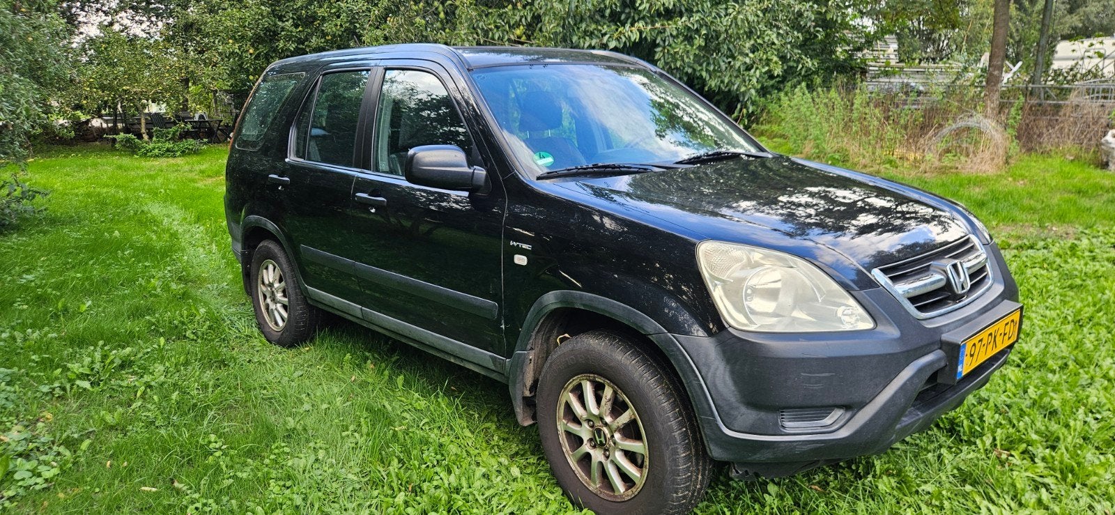 Honda CR-V 2.0 I 2004 Zwart, Auto's, Voorwielaandrijving, 1998 cc, Stof, 1429 kg