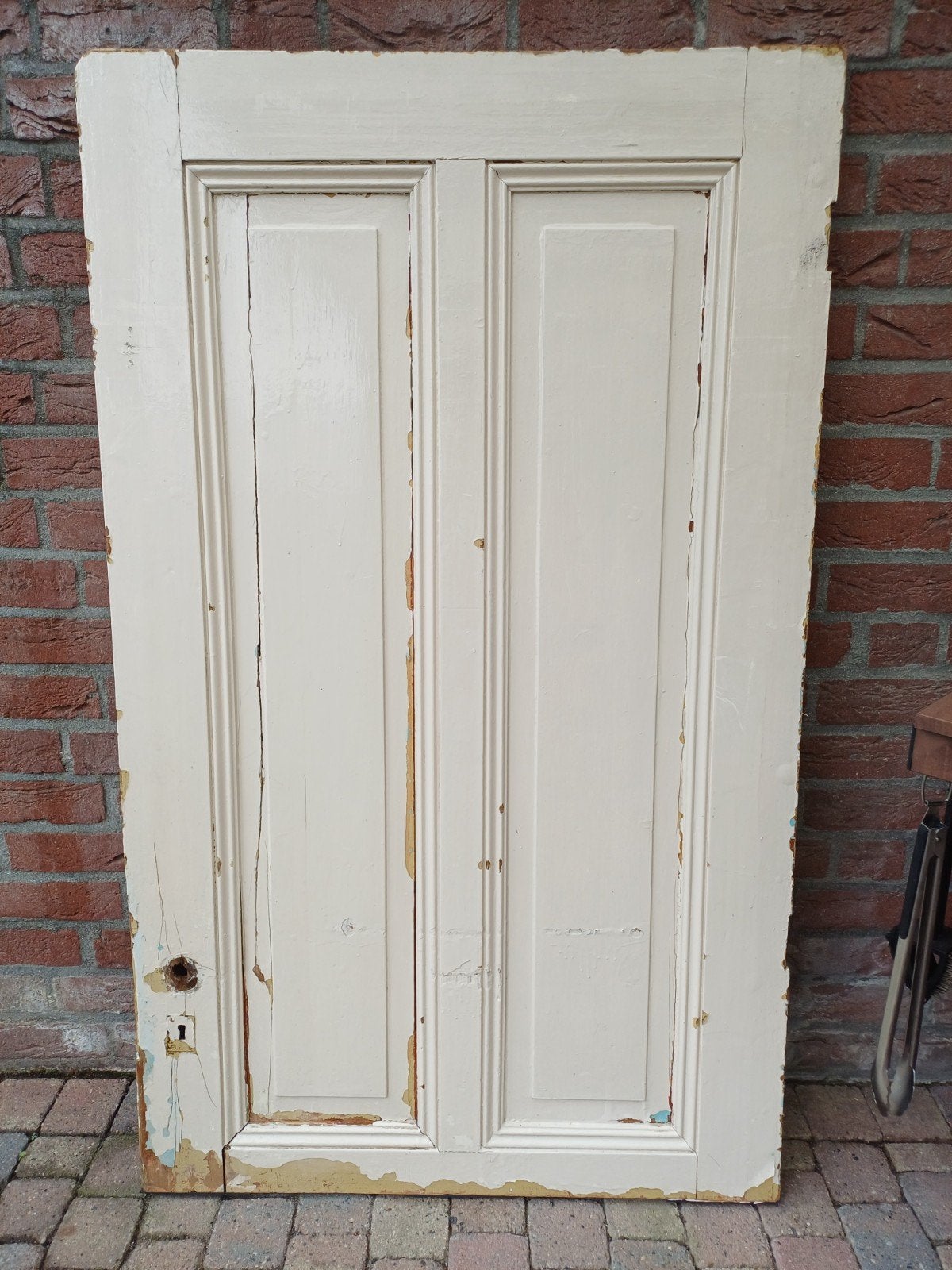 oude houten staldeur, Ophalen