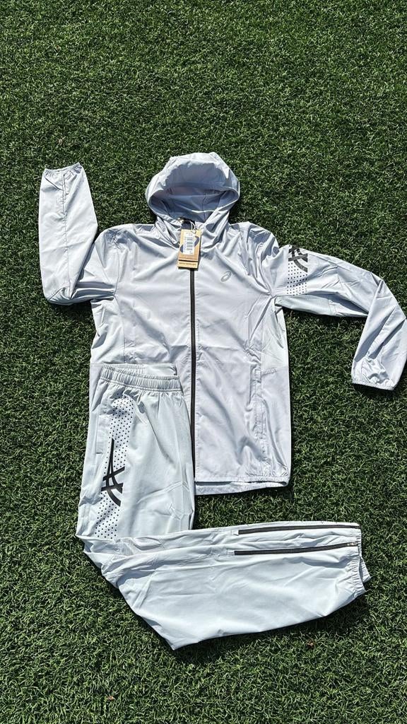 Asics trainingspakken licht grijs en zwart, Kleding | Heren, Sportkleding, Zwart, Nieuw, Overige maten, Ophalen of Verzenden