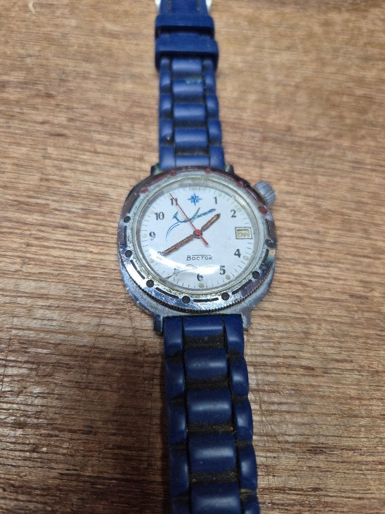 Russisch pols horloge Vostok met vliegtuig/raket, Overige merken, Gebruikt, Staal, Polshorloge