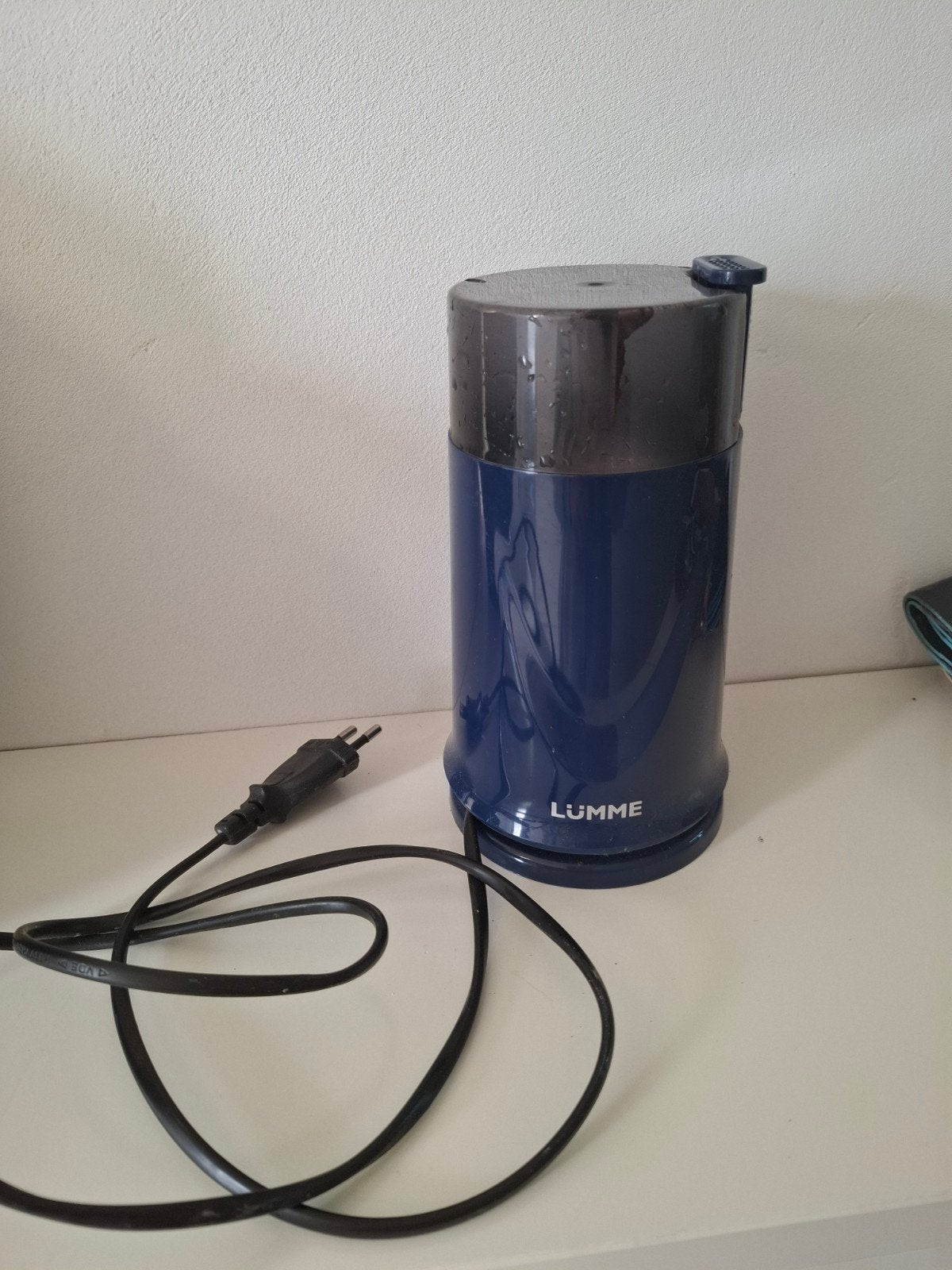 Elektrische koffiemolen, Ophalen